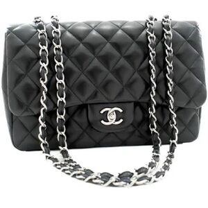 VINTAGE Chanel Black Quilted Calfskin Caviar Classic Flap Bag with Silver Metal